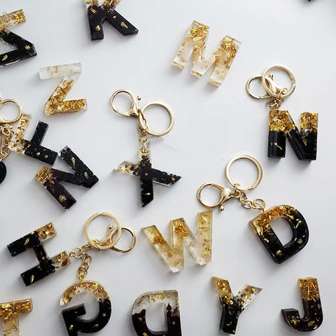 Little Luxuries Designs Glitter Filled Black and Gold Acrylic Letter/Initial with Pom Pom Keychain/Bag Charm